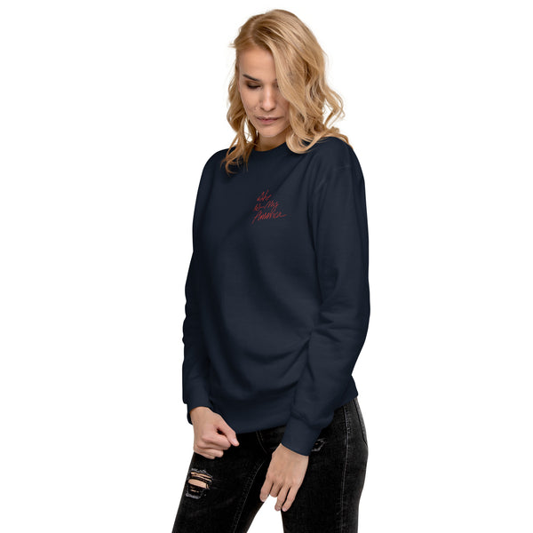 Unisex Premium Sweatshirt in Navy Blazer with Red Embroidered Lettering: She Is My America